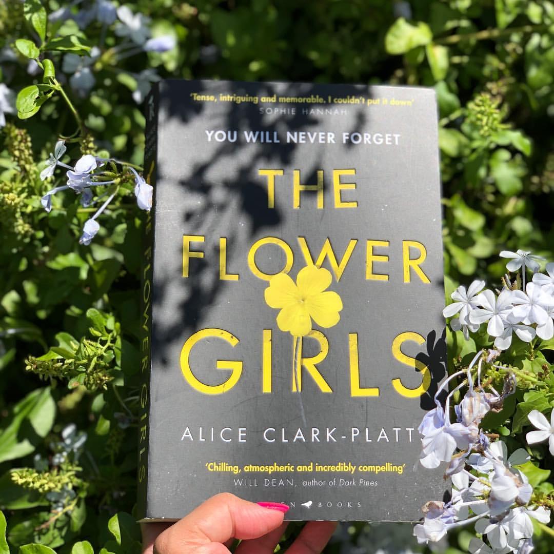 photo of book in the grass