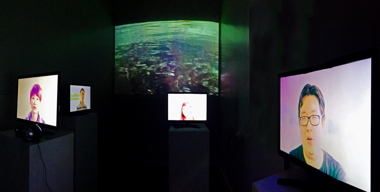 phot of multiple screens in a room