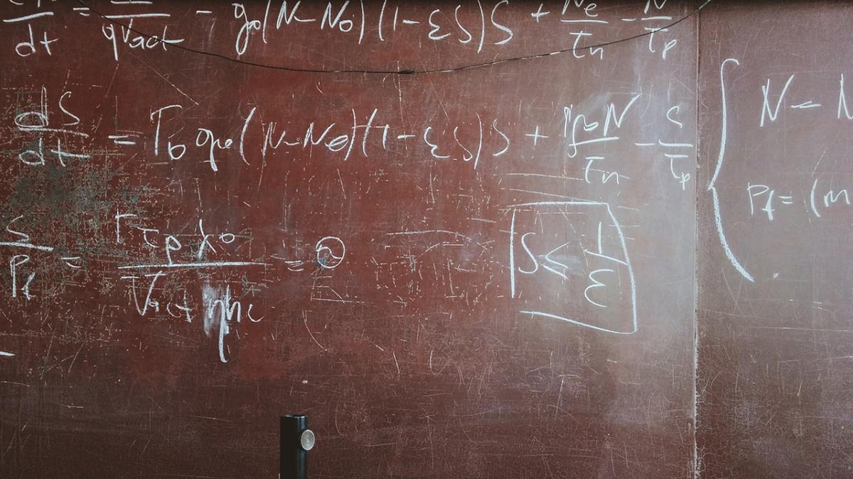 number equation scribbles on a board